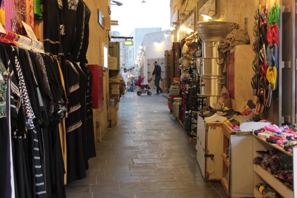 Outdoor market men pushing baby carriages